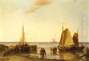 Fisherfolk near beached pinken at dusk