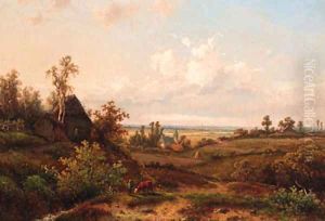A young cowherd near a cottage in a summer landscape