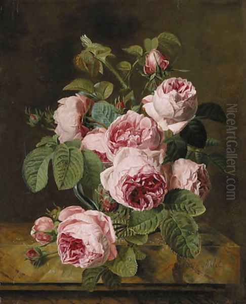 Pink roses in a glass vase on a marble edge - view 1