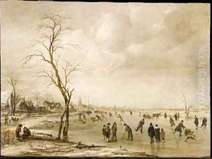 A Winter Landscape with Townsfolk Skating and Playing Kolf on a Frozen River a Town Beyond