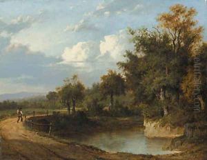A wooded river landscape with a traveller on a track by Patrick Nasmyth