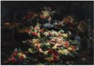 An Abundance Of Flowers In The Artist's Studio by Georges Jeannin
