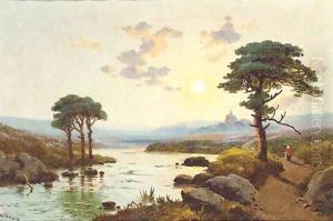 A figure on a river bank at dusk