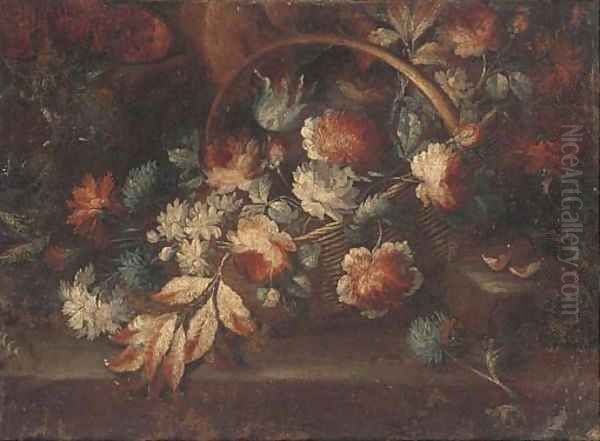 A basket of flowers on a ledge in a clearing - view 1