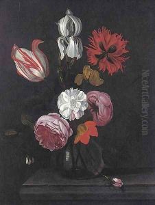 A parrot tulip, roses, an iris and other flowers in a glass vase on a stone ledge by Marten Nellius