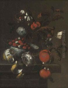 A delft blue and white bowl with cherries
