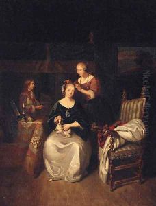 A lady seated in an interior with a spaniel on her lap, a servant tending her hair by Caspar Netscher