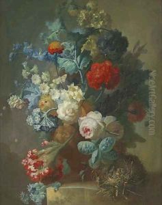 Roses, cineria, cockscombe, auricula, hops, hollyhocks, narcissi, helichrysum, geum and a carnation in a sculpted vase with chicks in a nest