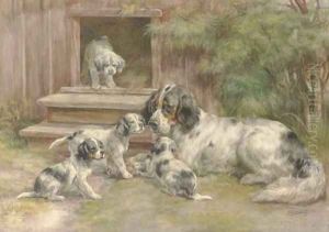 A Setter and her puppies outside a kennel