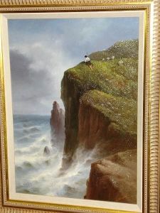 A Coastal Scene With A Shepherd And Sheep Atop A Cliff, Signed by S.L. Kilpack
