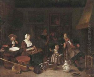 A kitchen interior with a woman cutting fish and a girl playing with a dog by Adriaen Jansz. Van Ostade