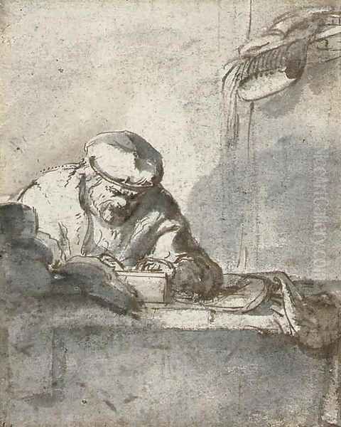 A man seated at a table writing - view 1