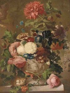 Roses, carnations and other flowers in a sculpted vase on a ledge with a bird's nest