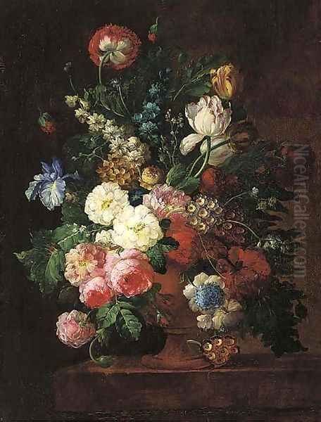 Roses, irises, tulips, and other flowers in a stone urn on a ledge - view 1