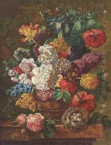 Summer flowers in a vase, with a bird's nest to the side, on a ledge
