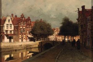 A Canal In A Town by Johannes Christiaan Karel Klinkenberg