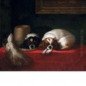 Two Cavalier King Charles Spaniels Beside A Feathered Hat by Sir Edwin Henry Landseer