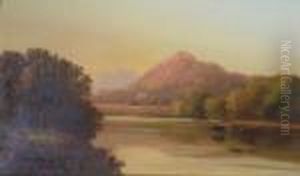 A River Landscape At Sunset