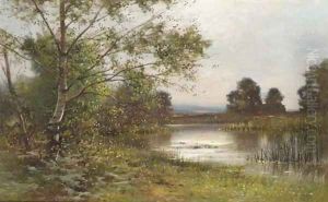 Cattle watering in a sunlit lake by Ernest Parton