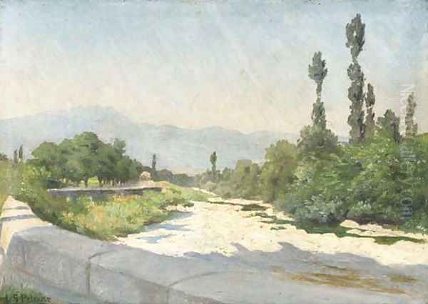 A rocky river bed in a sunlit landscape - view 1