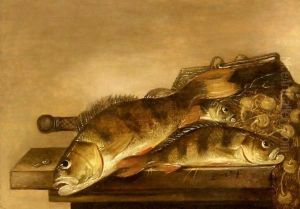 Sea bream, a fishing basket and nets on a wooden table Sea bream, a fishing basket and nets on a wooden table