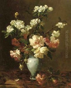 Blossom branches and peonies in a vase