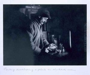 Ponting developing a plate in the dark room, from Scotts Last Expedition by Herbert Ponting