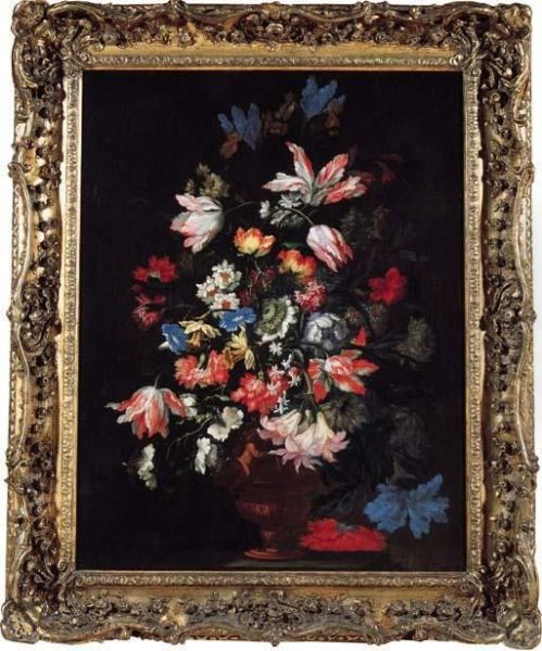 Tulips, Carnations, Chrysanthemums And Other Flowers In A Sculpted Vase On A Stone Ledge - view 1