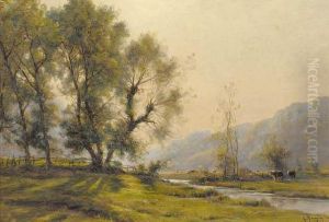 Cattle Grazing In A River Landscape Cattle Grazing In A River Landscape