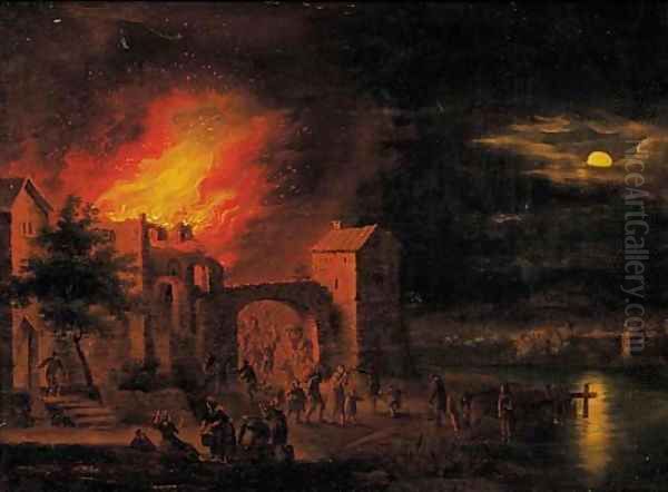 A town on fire at night - view 1
