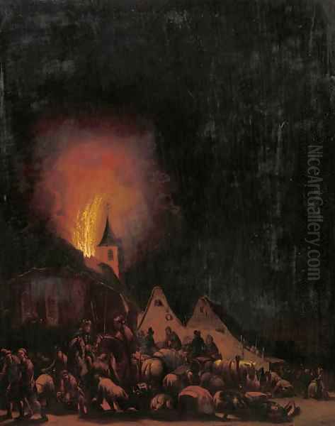 A village on fire at night - view 1