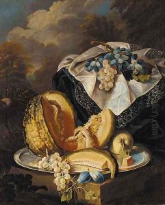 Grapes, melon, an apple and plums on a silver salver