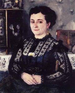 Woman In A Lace Blouse by Pierre Auguste Renoir