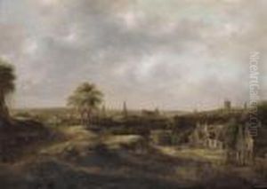 An Extensive Landscape With A Panoramic View Of A Town