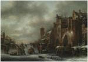 A Winter Landscape With Numerous Figures On A Frozen River Outsidethe Town Walls