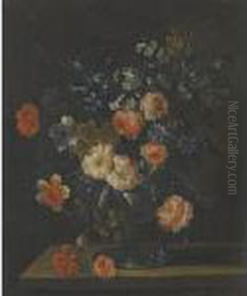 A Still Life With Carnations, Roses And Other Flowers In A Glassvase Over A Stone Ledge - view 1