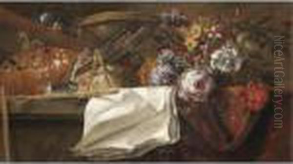 Still Life With Artist's 
Materials, Including A Used Palette And A Series Of Brushes, Together 
With A Small Basket Of Flowers On A Table Top - view 1