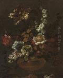 A Parrot Tulip, Chrysanthemums, 
Stock, Primula, And Other Flowers In A Sculpted Urn On A Ledge