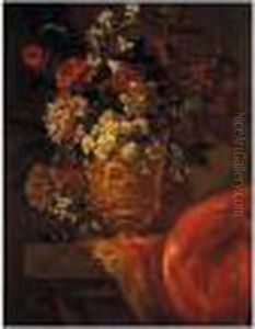 A Still Life Of Various Flowers 
In A Gilt Sculpted Urn, Upon A Stone Pedestal, Partly Draped With A Rug by Jean-Baptiste Monnoyer