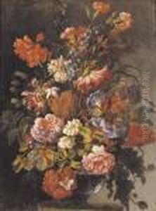 Carnations, Peonies, Morning Glory And Other Flowers In A Glass Vase On A Ledge