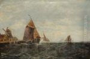 Fishing Boats Off A Jetty With A Windmill