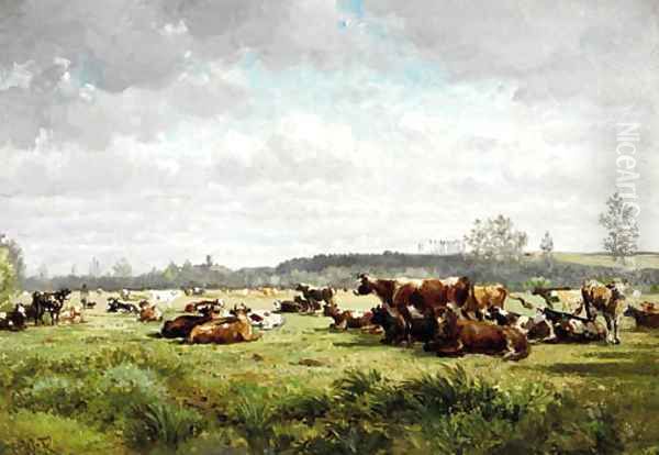 Cows grazing in a meadow in summer - view 1