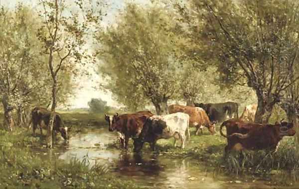 Cattle by a wooded pond - view 1