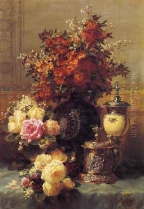 Still Life of Roses and Other Flowers, a Silver-gilt Ostrich Egg Cup and a German Gold-gilt Tankard on a Draped Table in an Interior