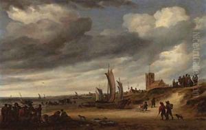 The beach at Egmond-aan-Zee, with figures and boats on the shore