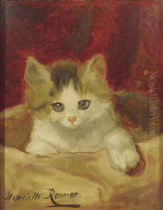 Kitten on a pink cushion