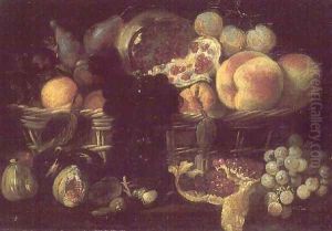 A basket of fruit and a plate of fruit by Giuseppe Recco