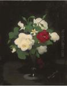 Red And White Flowers In A Glass Vase