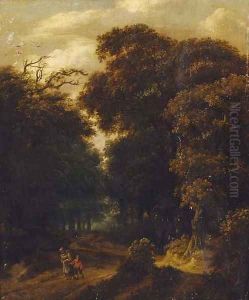 A wooded landscape with a mother and child on a track by Salomon Rombouts