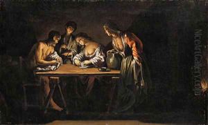 Figures around a table lit by an oil lamp